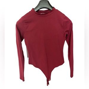 Burgundy bodysuit by Fashion Nova size M